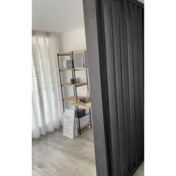 Separador ambientes listones de madera verticales